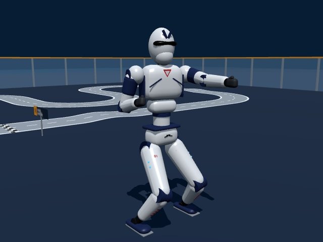 Unitree R1 humanoid, white with navy-blue joints, in a kung fu stance
