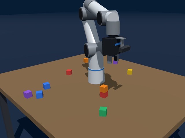 Six-axis robot arm on a table stacking coloured blocks with its gripper
