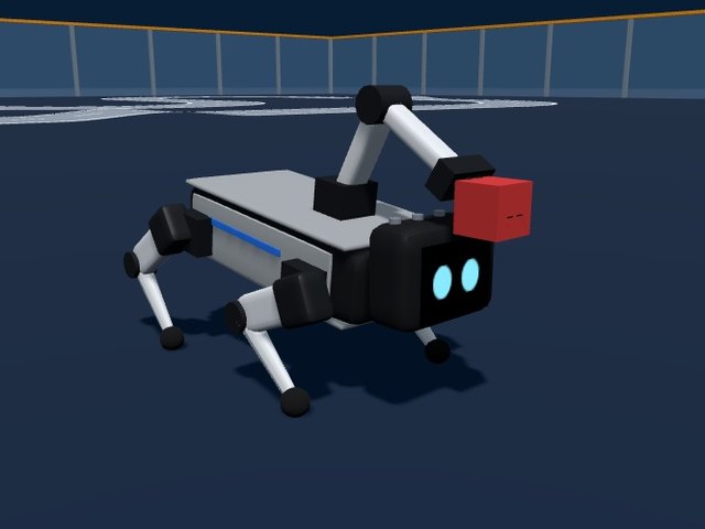 XGO-Lite3 robot dog holding a red cube in the gripper of the arm on its back